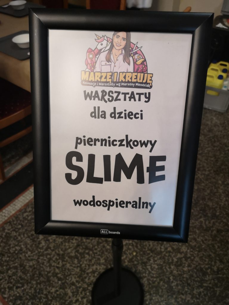 Tabliczka z atrakcją "Slime"